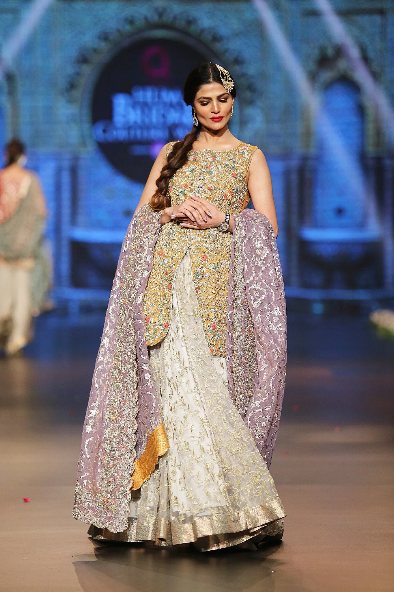Designer embroidered lehnga dress in lilac, gold and white color # B3355