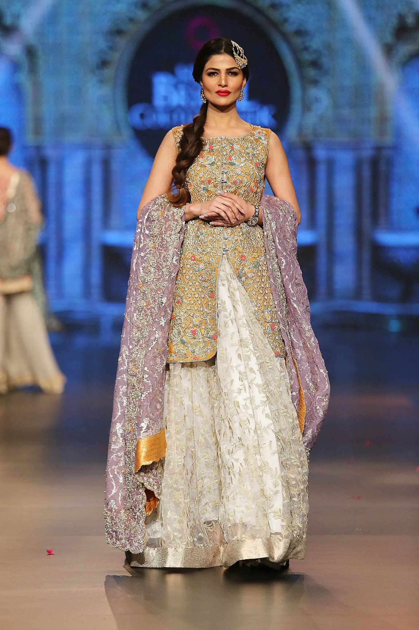 Designer embroidered lehnga dress in lilac, gold and white color # B3355