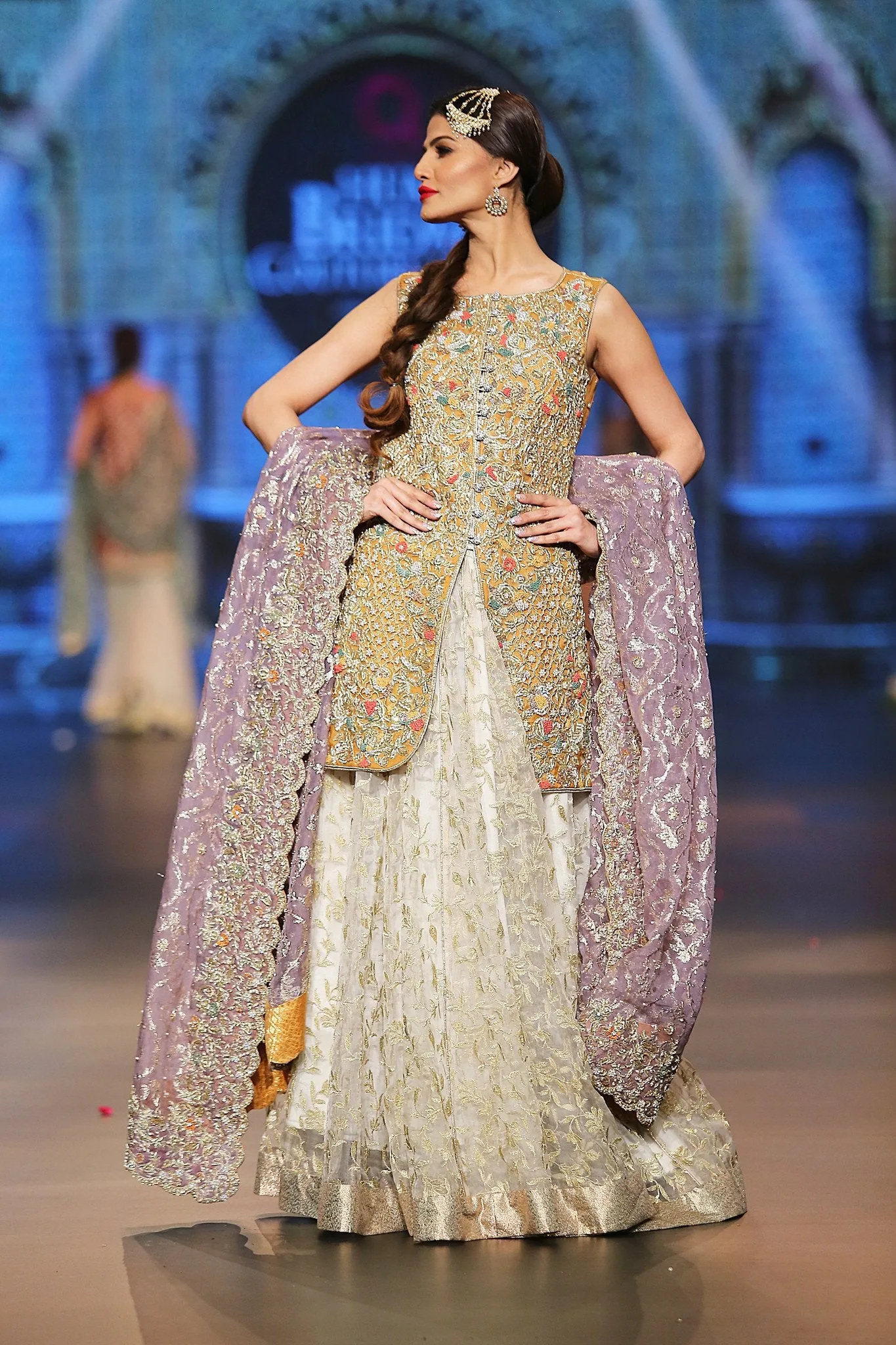 Designer embroidered lehnga dress in lilac, gold and white color # B3355