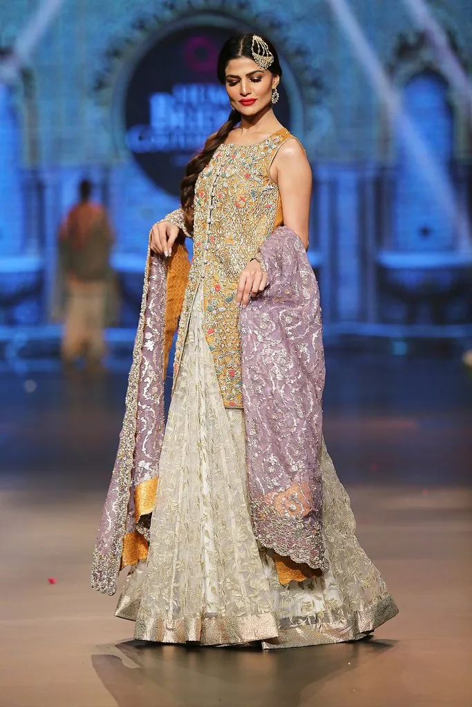 Designer embroidered lehnga dress in lilac, gold and white color # B3355
