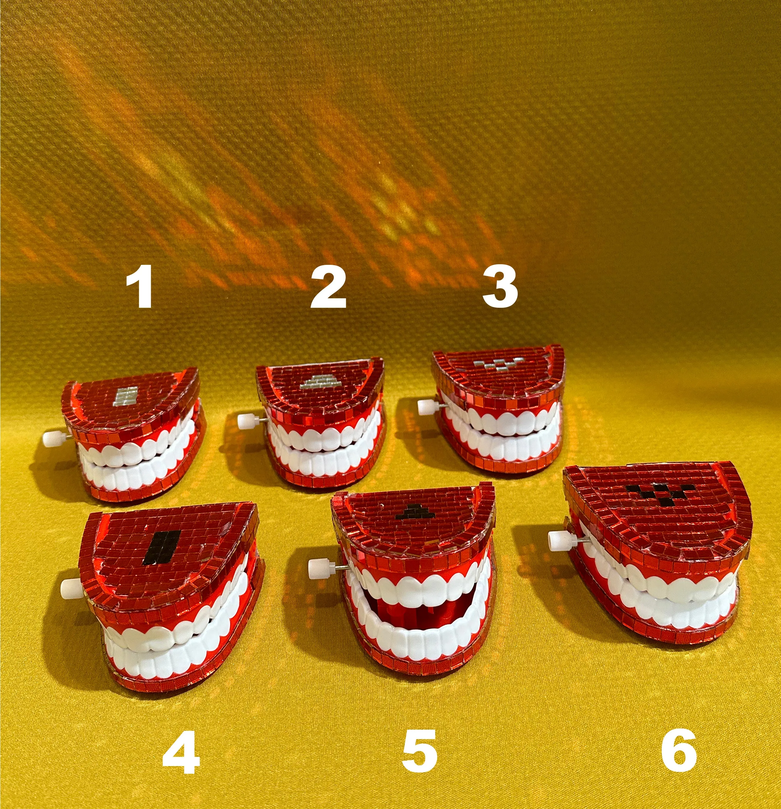 Janet Loren Hill, "Mosaic Chattering Teeth (Game Pieces)"