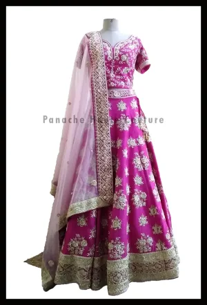 Pleasant Pink Partywear Raw Silk Lehenga Choli