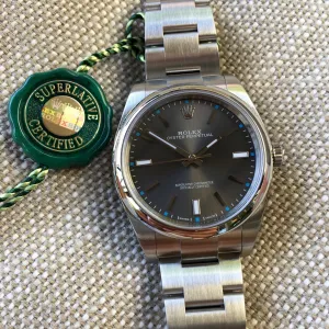 Rolex Oyster Perpetual 114300 Dark Rhodium Stainless Steel Mens Watch