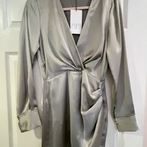Zara Satin Wrap Dress in light green. NWT